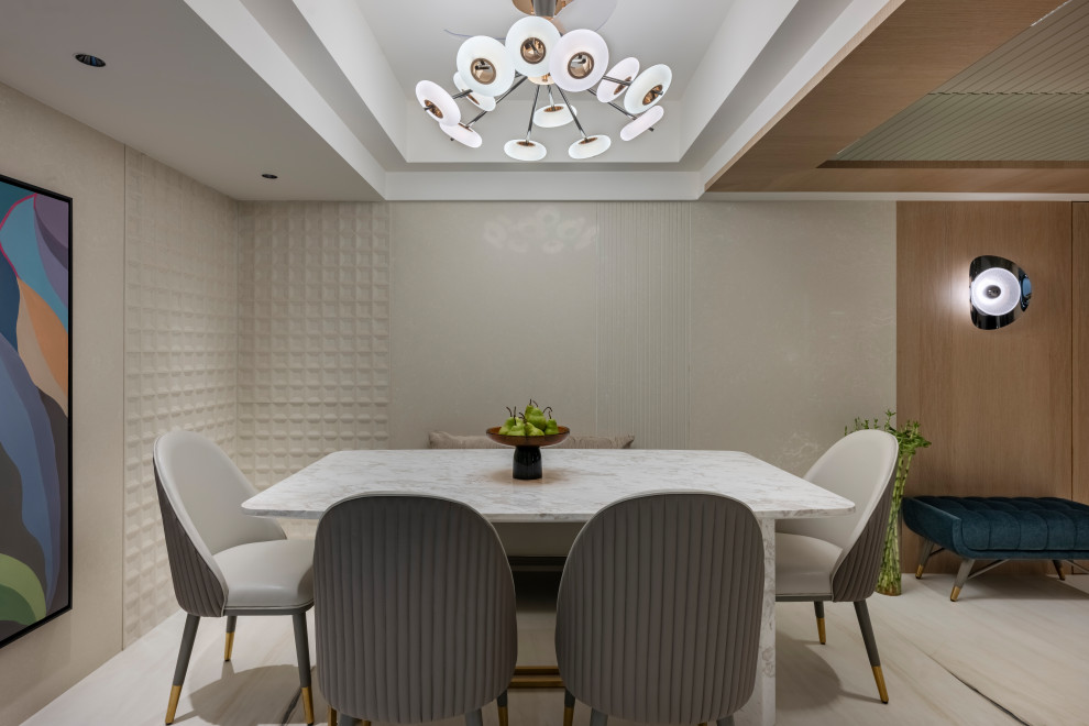 Design ideas for a contemporary dining room in Mumbai.