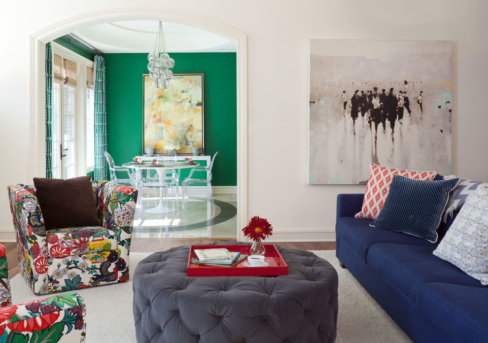 Inspiration for an eclectic enclosed living room in Denver with white walls and dark hardwood floors.