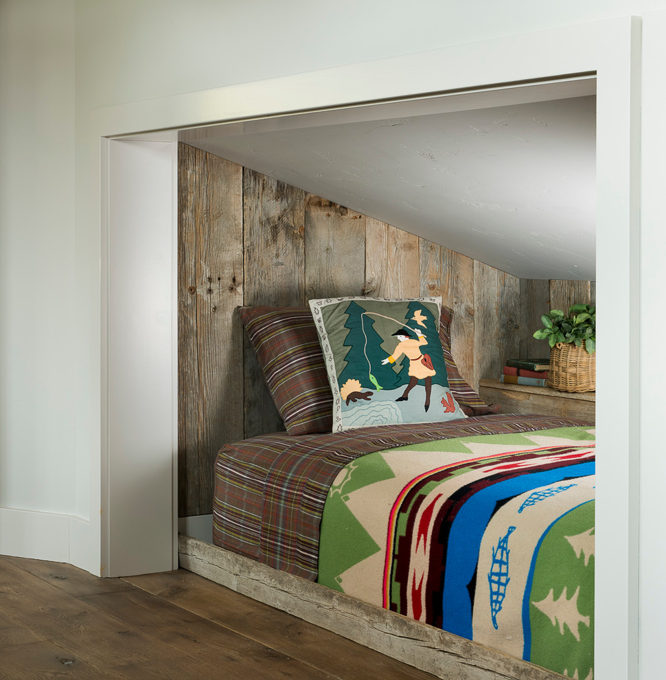 Example of a mountain style dark wood floor bedroom design with white walls