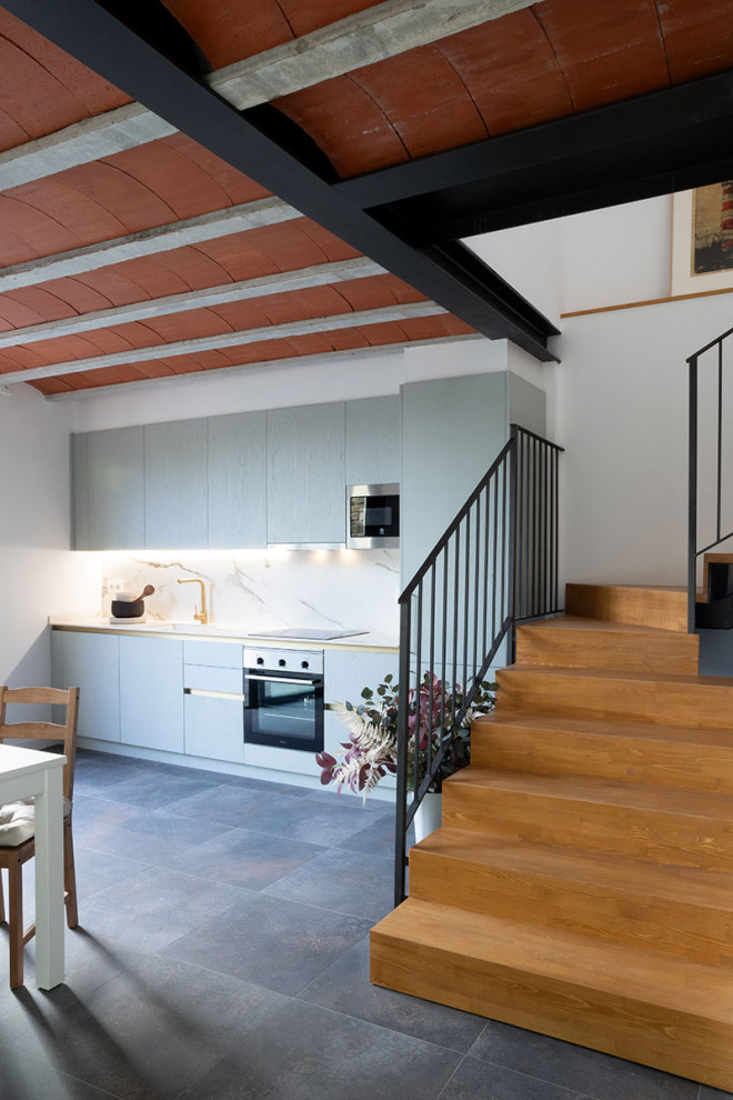 Идея дизайна: кухня в стиле модернизм с плоскими фасадами