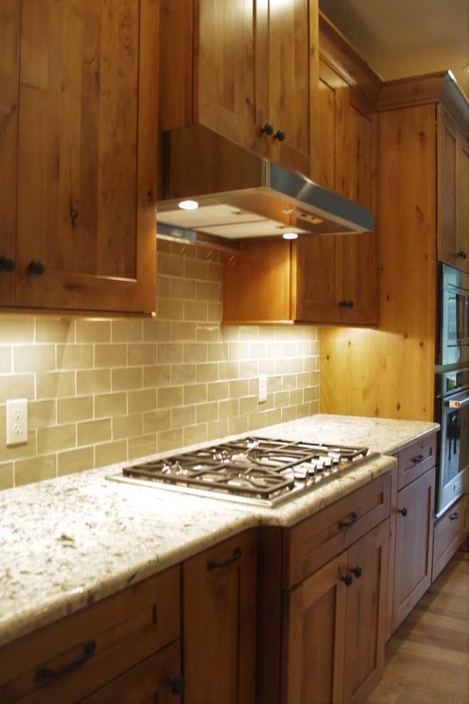 Kitchen - rustic kitchen idea in Grand Rapids