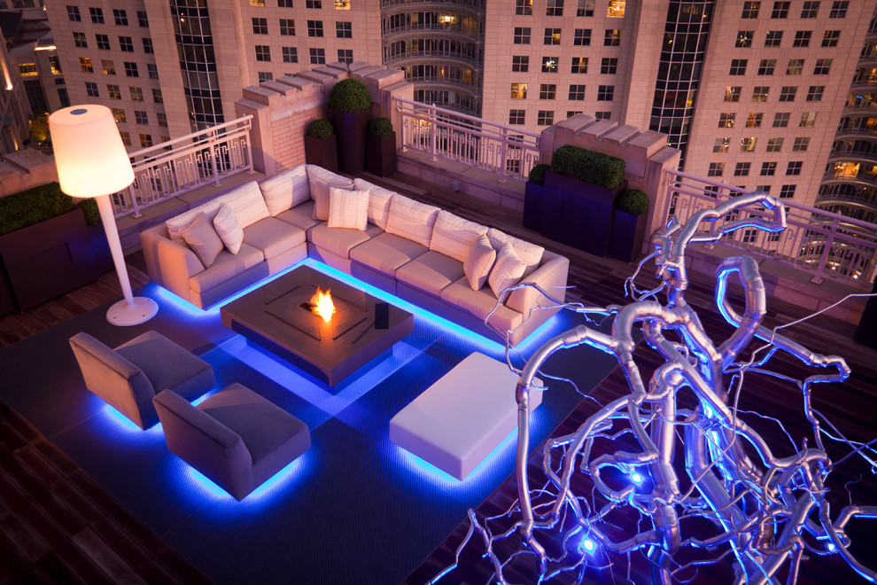 Inspiration for a contemporary rooftop and rooftop deck in Dallas with a fire feature.