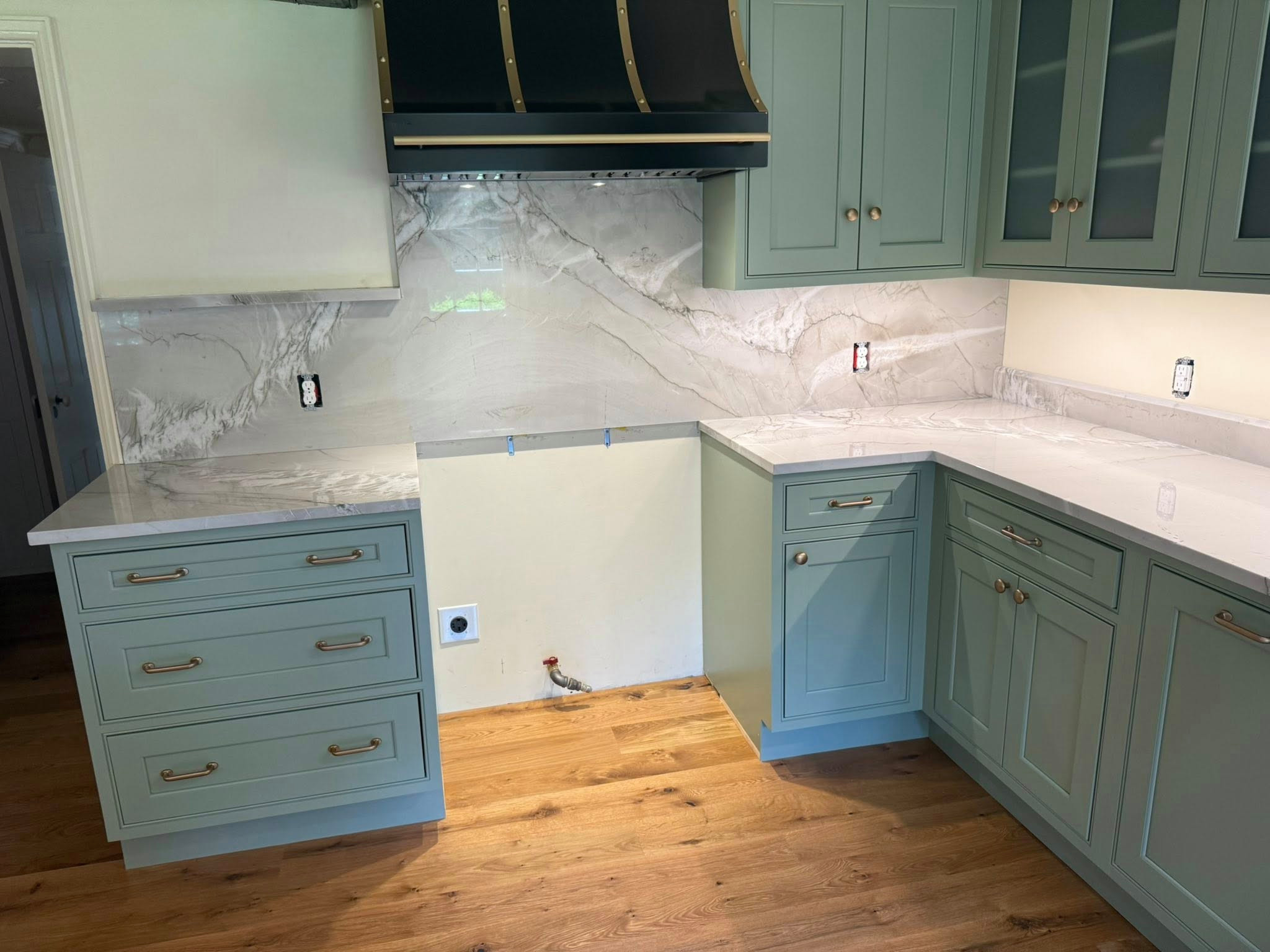 Quartzite tops and full height splash