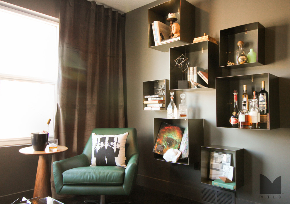 Small minimalist enclosed dark wood floor living room library photo in Salt Lake City with gray walls and no tv