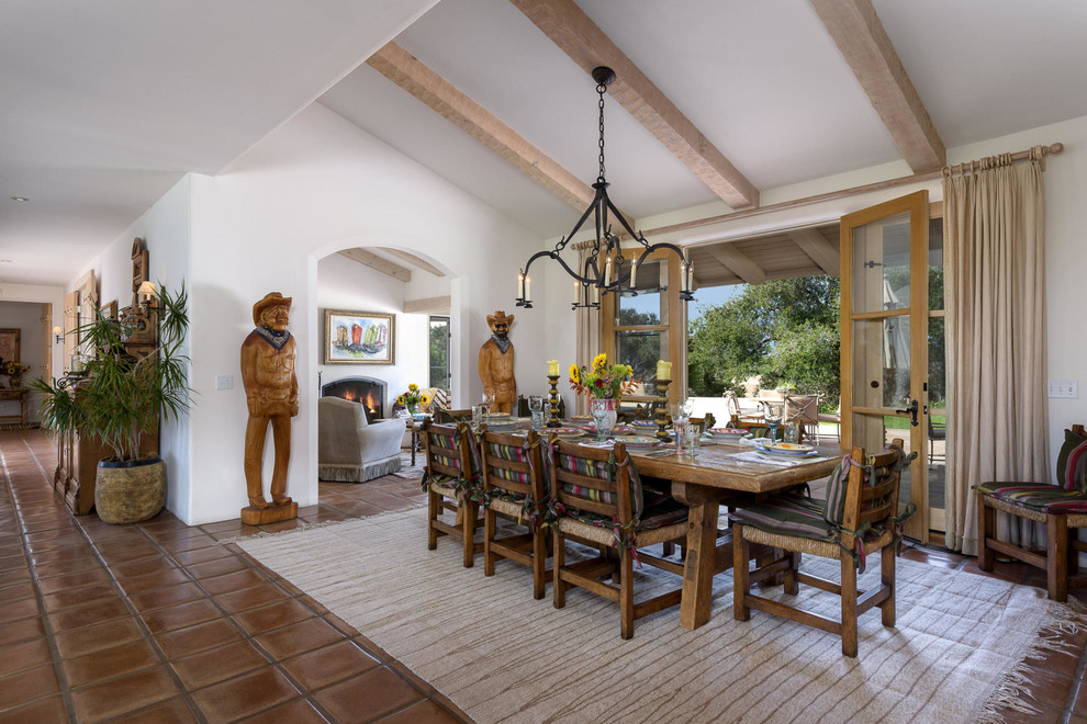 Photo of a dining room in Santa Barbara with white walls.