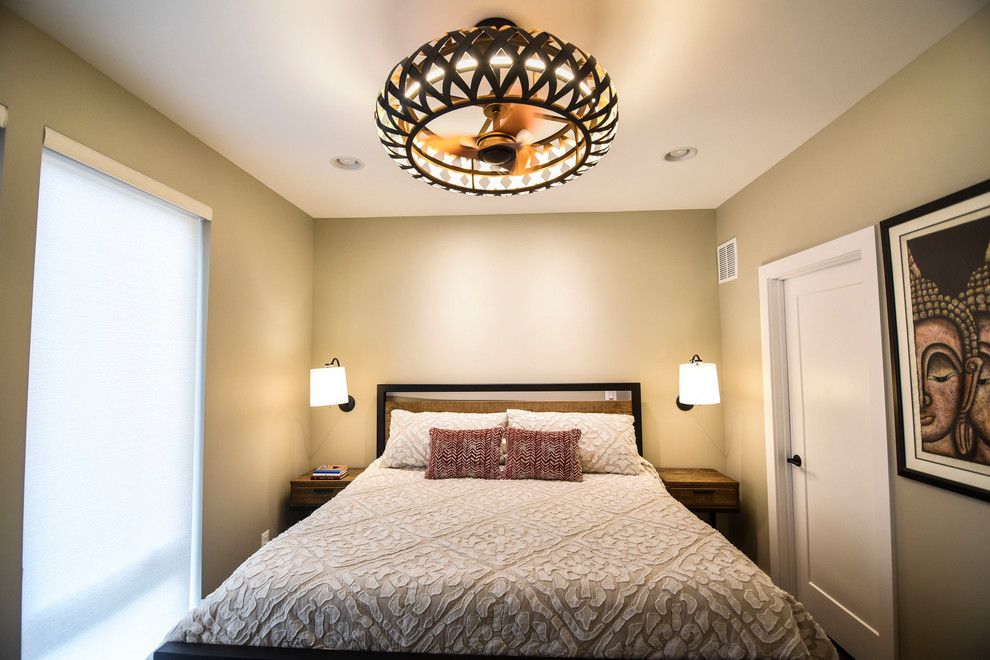 Small transitional master bedroom in Baltimore with beige walls, dark hardwood floors and brown floor.