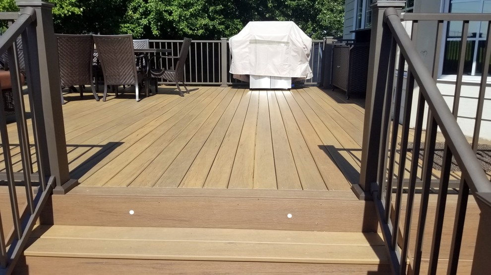 Example of a large backyard deck design with no cover