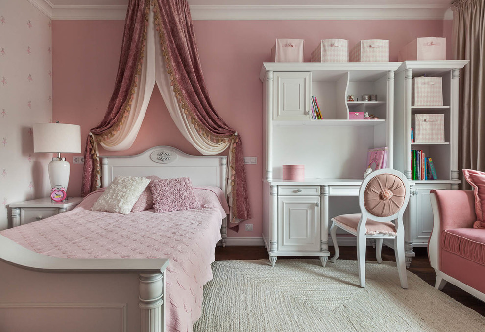 Inspiration for a traditional kids' bedroom for kids 4-10 years old and girls in Other with pink walls.