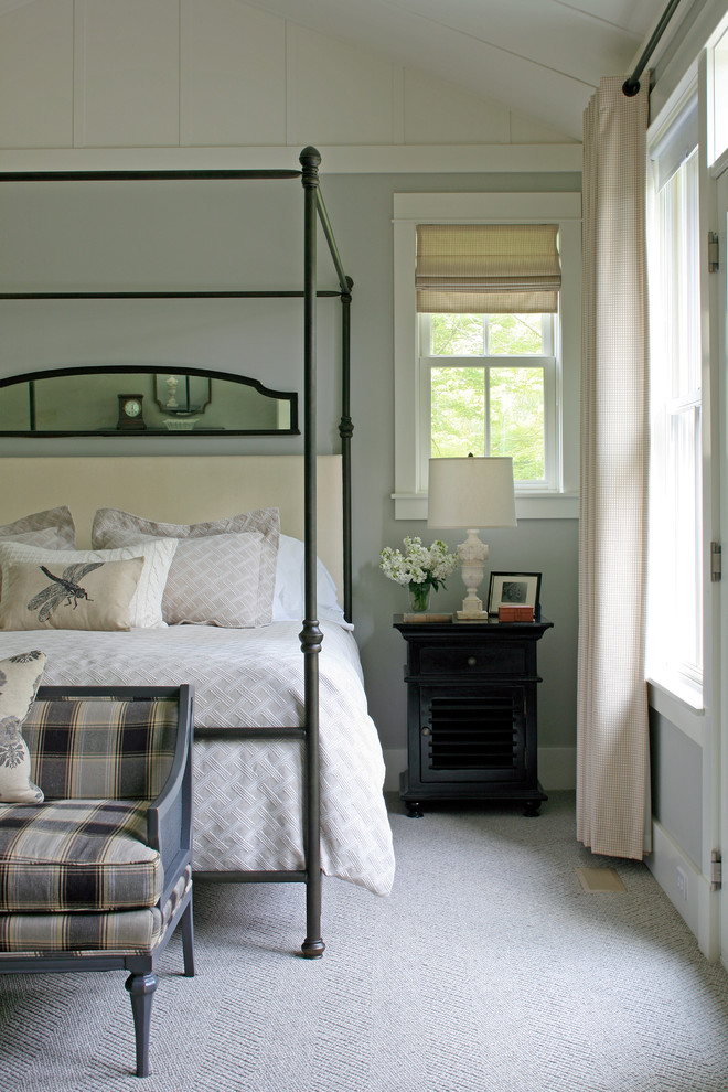Inspiration for a traditional bedroom in Other with grey walls and carpet.