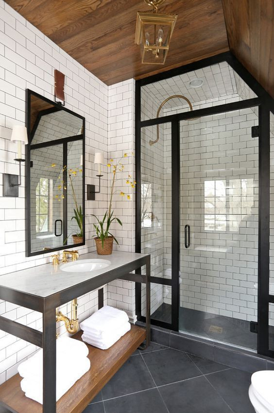 Design ideas for a mid-sized contemporary 3/4 bathroom in Charleston with open cabinets, white cabinets, an alcove shower, a one-piece toilet, white tile, ceramic tile, white walls, ceramic floors, an undermount sink, onyx benchtops, grey floor, a hinged shower door, white benchtops, an enclosed toilet, a single vanity, a freestanding vanity and wood.