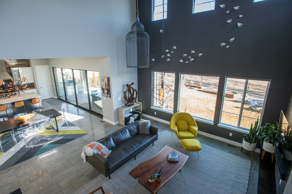Photo of a modern family room in Denver.