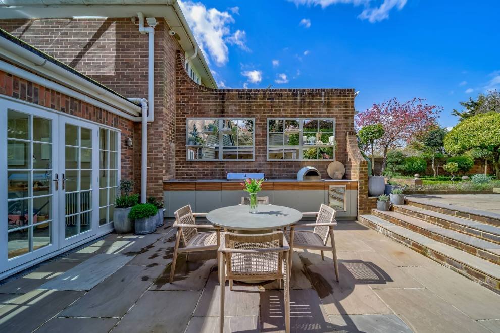 A contemporary outdoor kitchen masterpiece Contemporary Patio