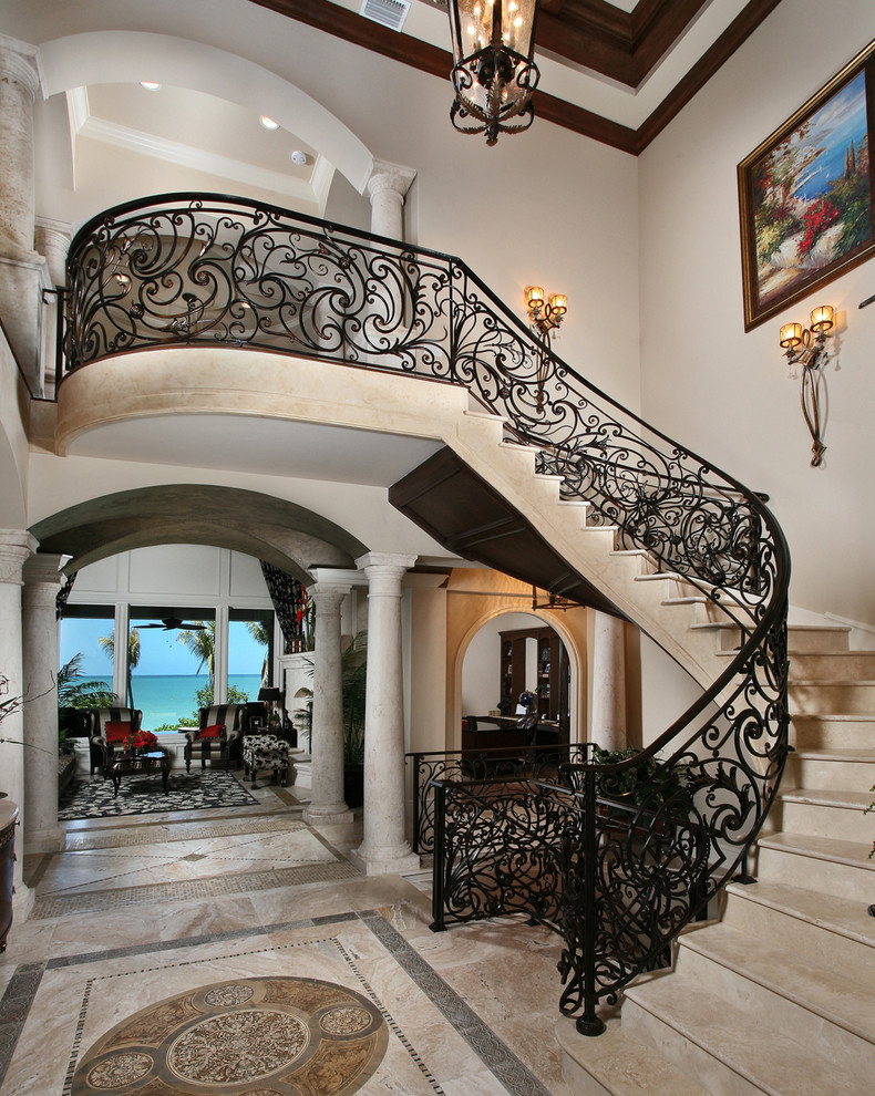 Inspiration for a mediterranean curved staircase in Miami.