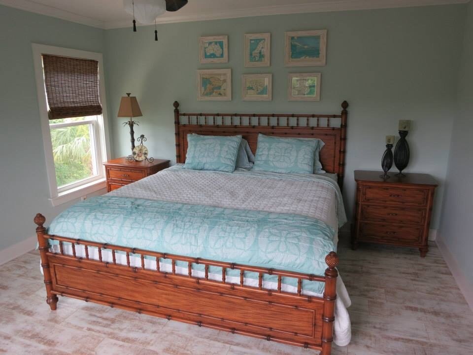 This is an example of a tropical bedroom in Toronto.