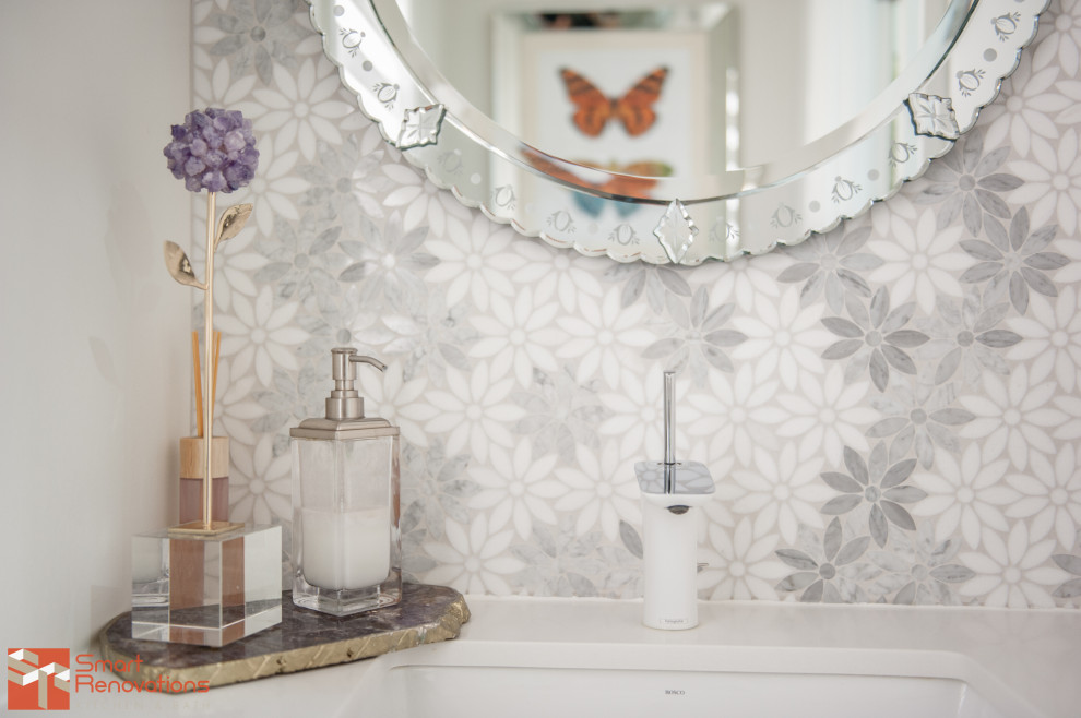 Inspiration for a modern powder room remodel in Toronto