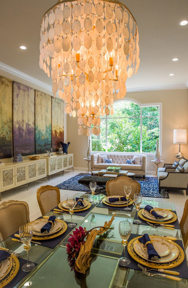 This is an example of a contemporary dining room in Miami with beige walls.
