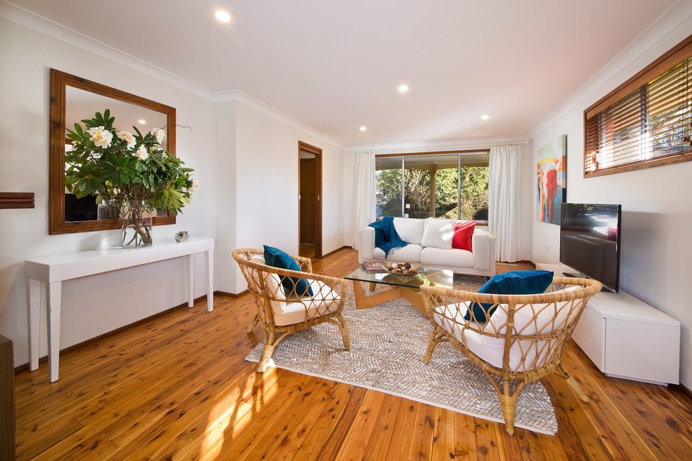 Photo of a beach style living room in Sydney.