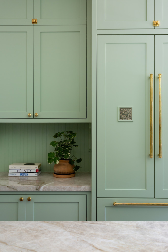 This is an example of a large arts and crafts kitchen pantry in Los Angeles with a farmhouse sink, shaker cabinets, green cabinets, quartzite benchtops, green splashback, ceramic splashback, with island and green benchtop.