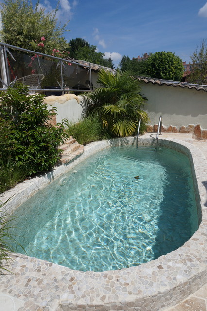 Construction maison individuelle tropical-pool