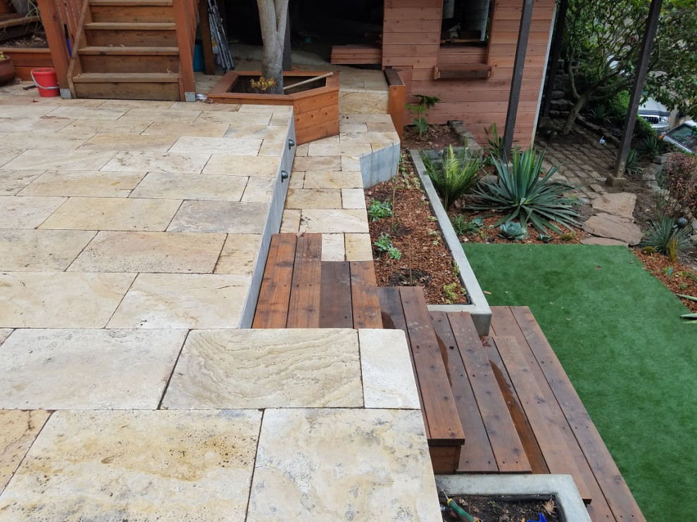 Raised Travertine Patio, Cement Walls with Redwood Appointments