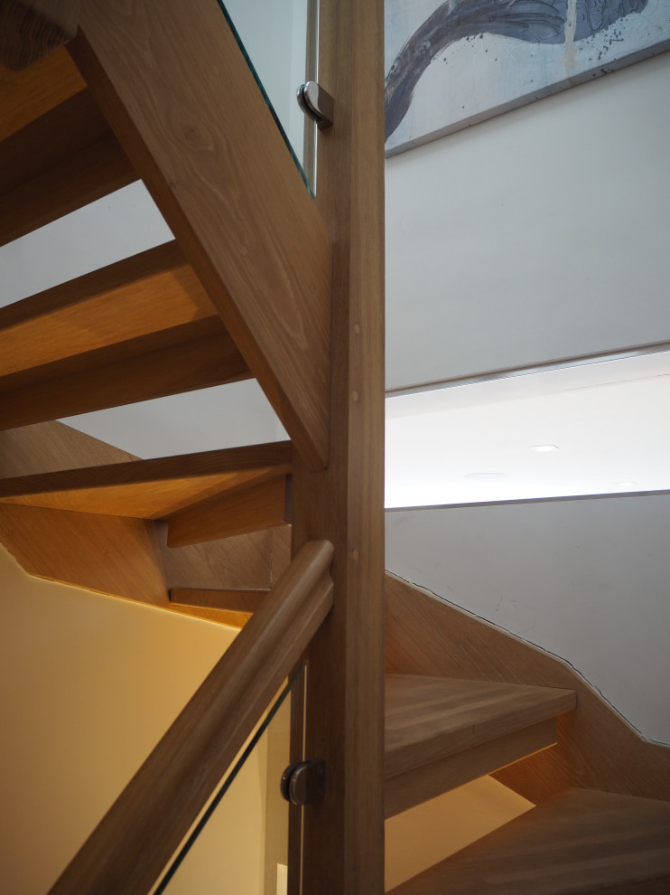 Photo of a large contemporary staircase in Sussex.