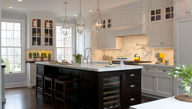 Kitchen - large transitional dark wood floor kitchen idea in Denver with an undermount sink, shaker cabinets, white cabinets, white backsplash, stone slab backsplash, paneled appliances and an island