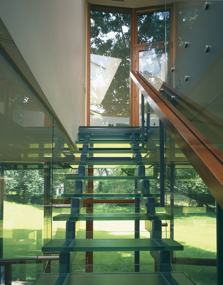 Inspiration for a mid-sized contemporary glass straight staircase in Boston with glass risers.