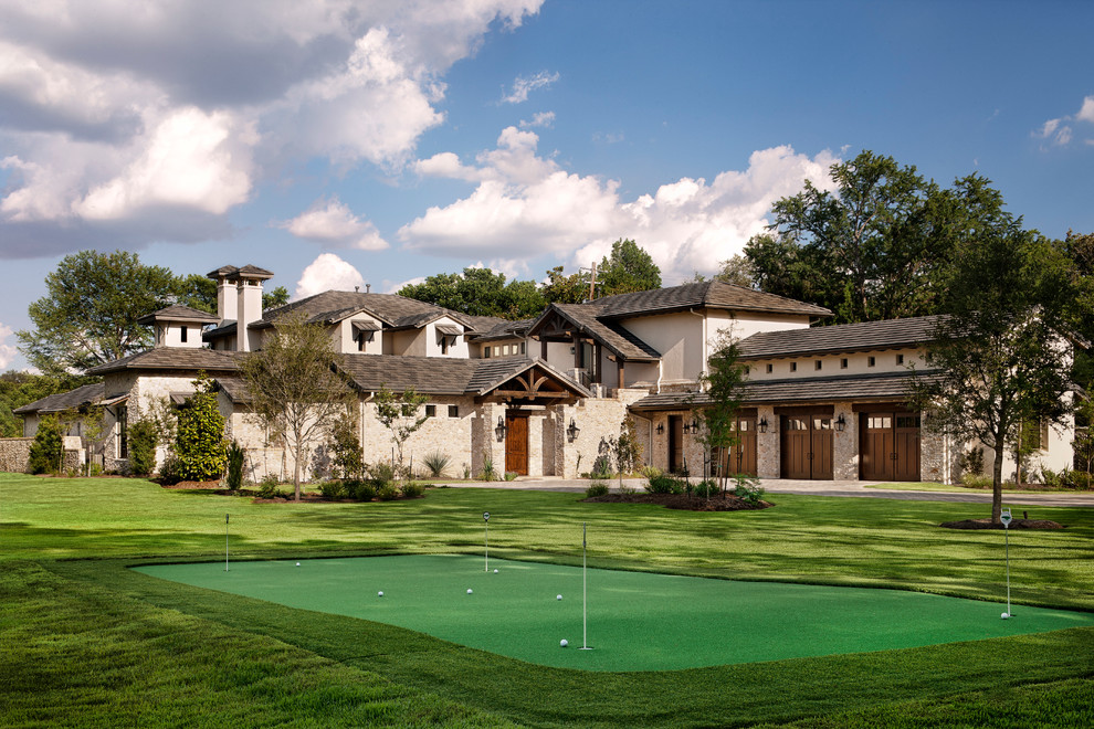 Design ideas for an expansive transitional outdoor sport court in Austin.