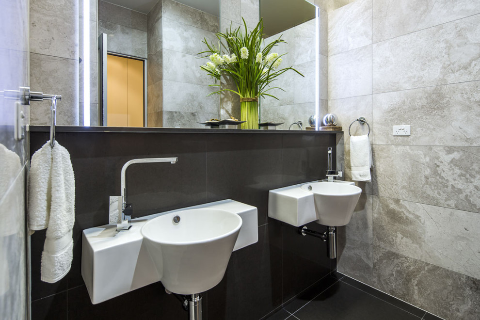 Large contemporary 3/4 bathroom in Adelaide with white cabinets, a freestanding tub, a one-piece toilet, brown walls, porcelain floors, open cabinets, brown tile, travertine, a wall-mount sink, brown floor and brown benchtops.