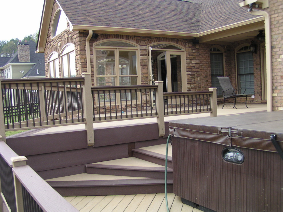 Inspiration for a large rustic backyard deck remodel in Atlanta with no cover