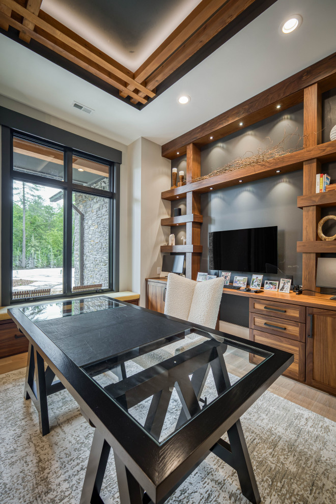 Example of a trendy family room design in Charlotte