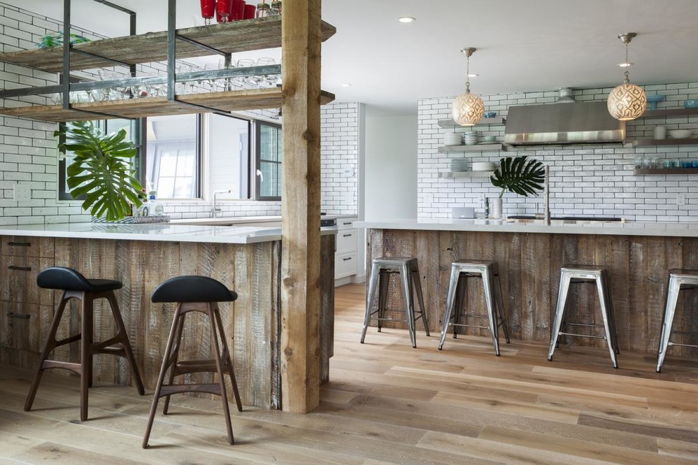 Inspiration for a large contemporary open plan dining in New York with white walls and medium hardwood floors.