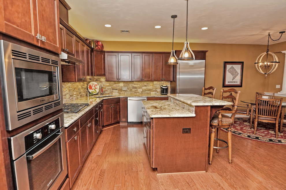 Example of a transitional kitchen design in Boston