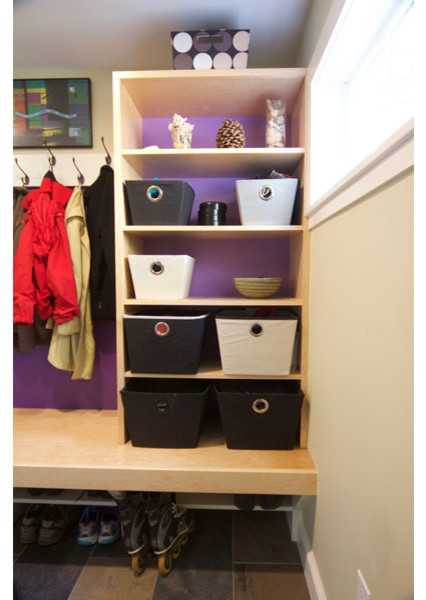 This is an example of a small contemporary mudroom in Boston with green walls, ceramic floors, a single front door and a purple front door.