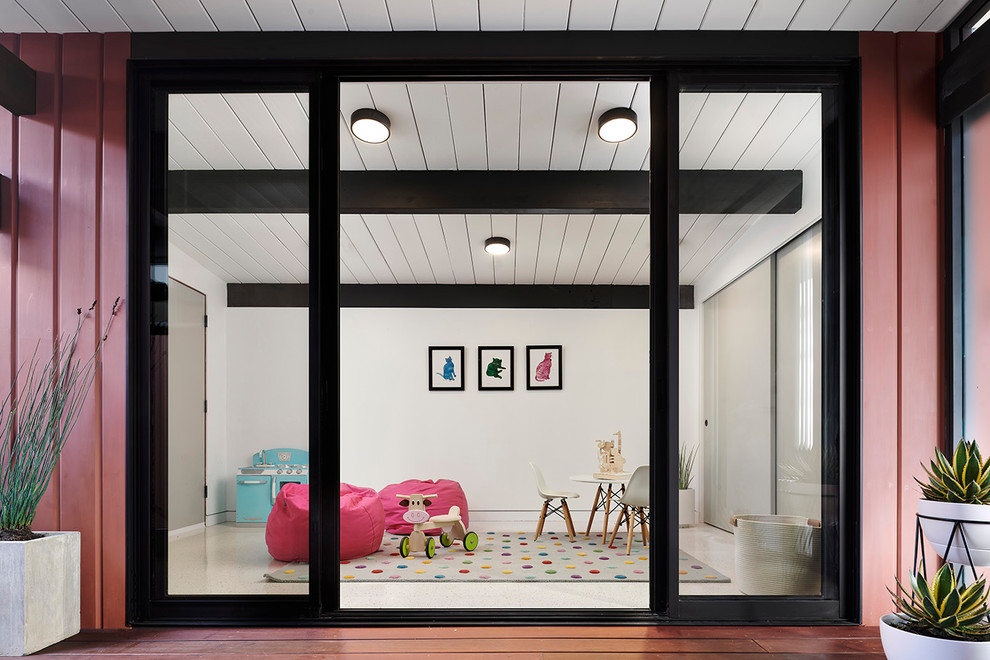 Inspiration for a small midcentury kids' playroom for kids 4-10 years old and girls in San Francisco with red walls, vinyl floors and white floor.
