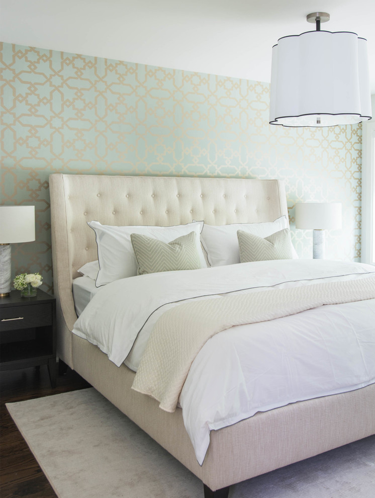 Inspiration for a transitional bedroom in Toronto with green walls and dark hardwood floors.