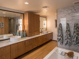 Transitional Bathroom by Identity Construction