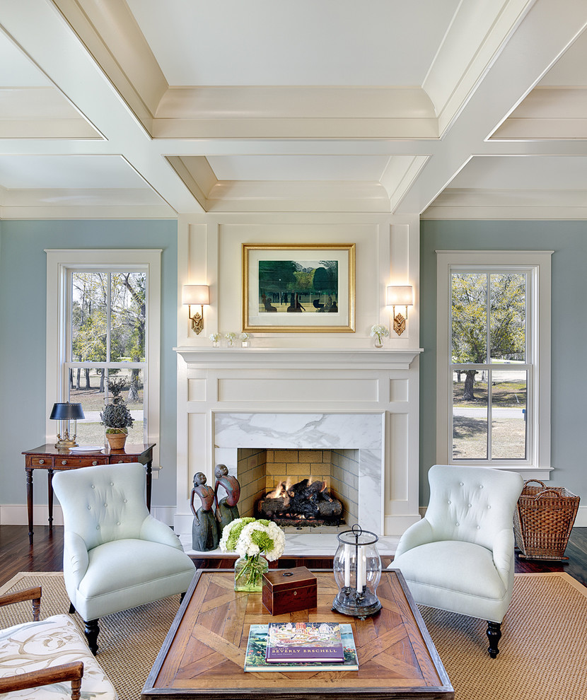 Photo of a traditional living room in Charleston with blue walls.