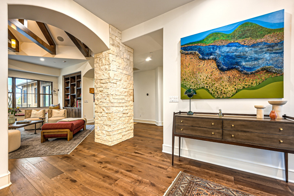 Example of a mountain style home design design in Denver