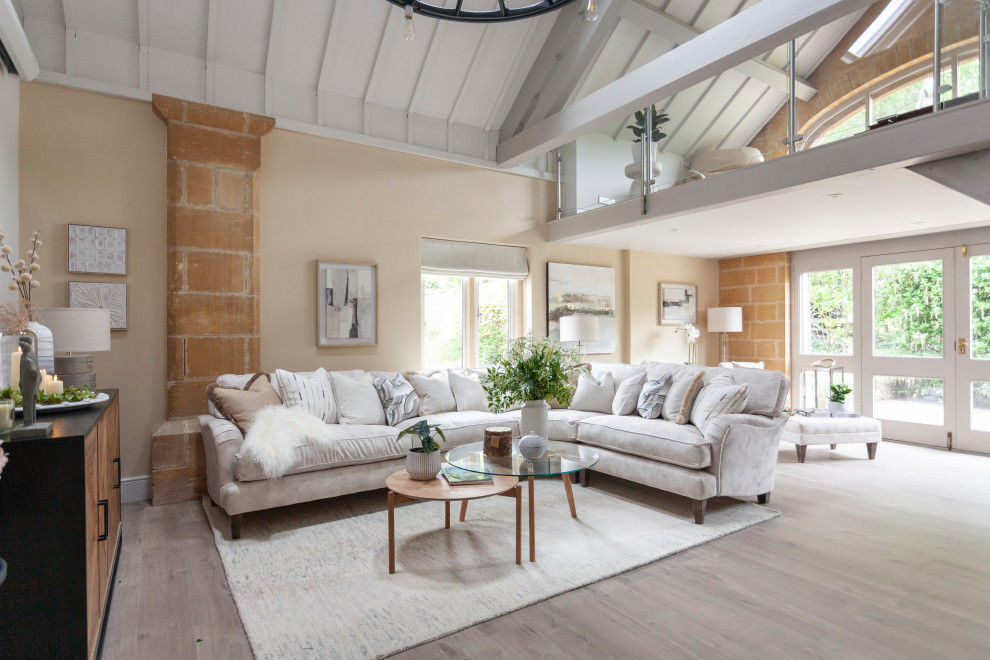 Inspiration for a large rural open plan living room in Other with a wood burning stove, a stone fireplace surround, a concealed tv and exposed beams.