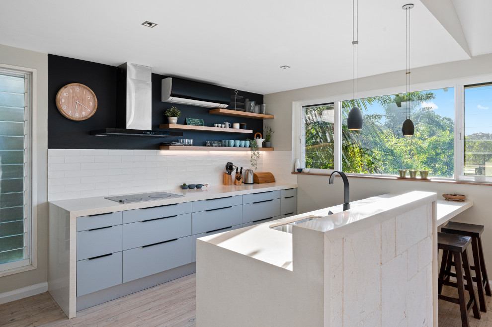 Example of a beach style kitchen design in Sydney