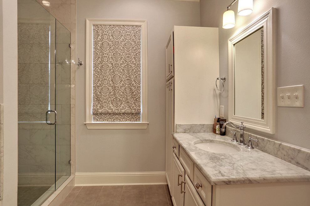 Design ideas for a traditional master bathroom in New Orleans with a drop-in sink.