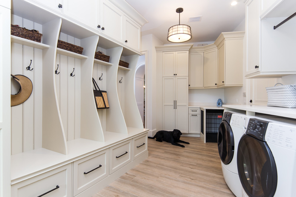 Traditional utility room in Orlando with shaker cabinets, beige cabinets, quartz benchtops, beige walls, ceramic floors, a side-by-side washer and dryer and beige floor.
