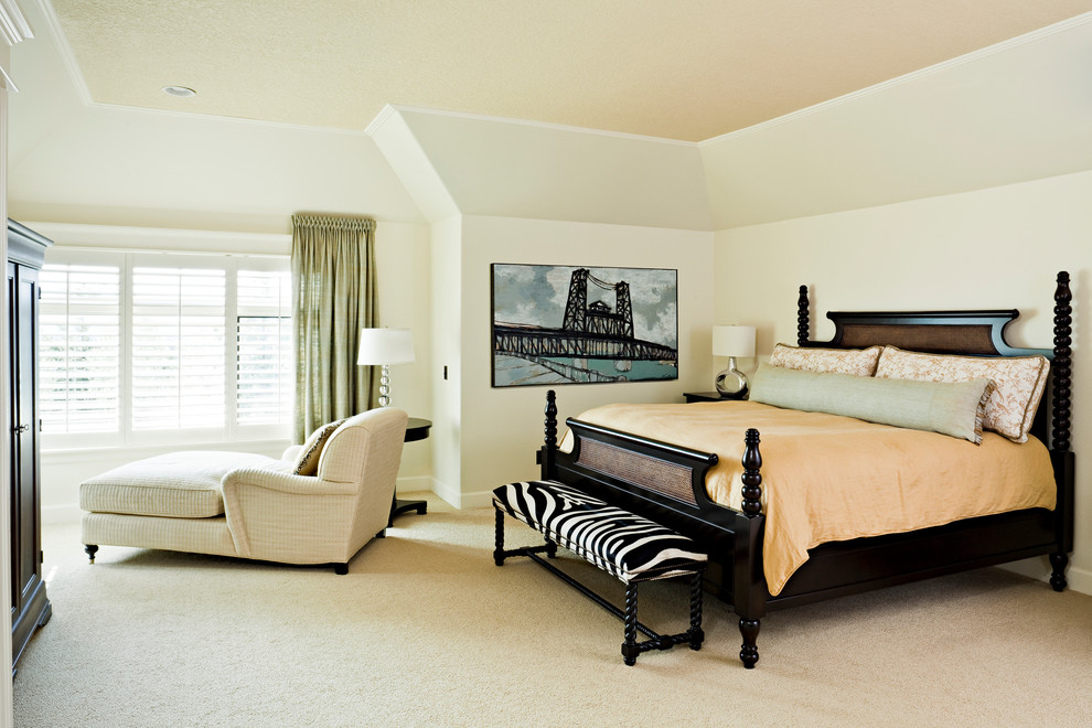 Traditional bedroom in Portland with beige walls and carpet.