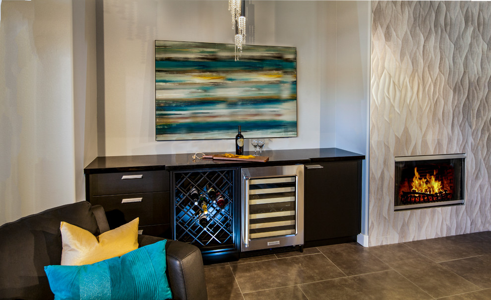Mid-sized modern single-wall wet bar in Los Angeles with porcelain floors, no sink, flat-panel cabinets, dark wood cabinets, wood benchtops and brown floor.