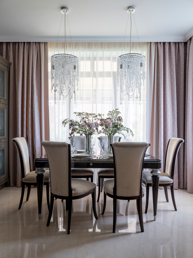 This is an example of a transitional dining room in Moscow with beige floor.