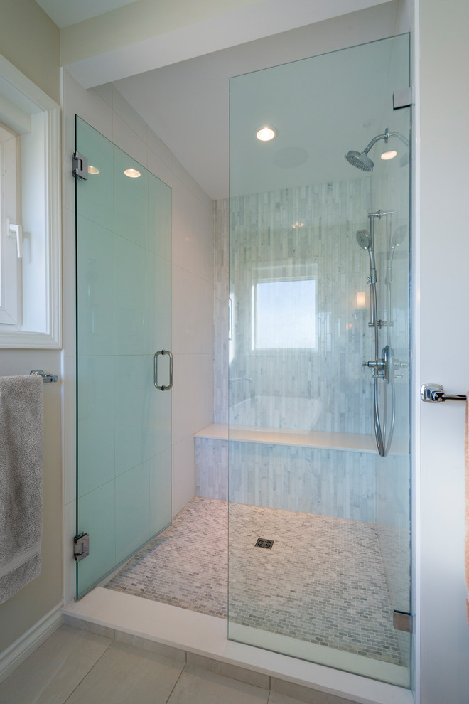 Inspiration for a mid-sized contemporary master bathroom in Vancouver with shaker cabinets, dark wood cabinets, a freestanding tub, a double shower, a one-piece toilet, porcelain floors, an undermount sink, quartzite benchtops, a hinged shower door and white benchtops.