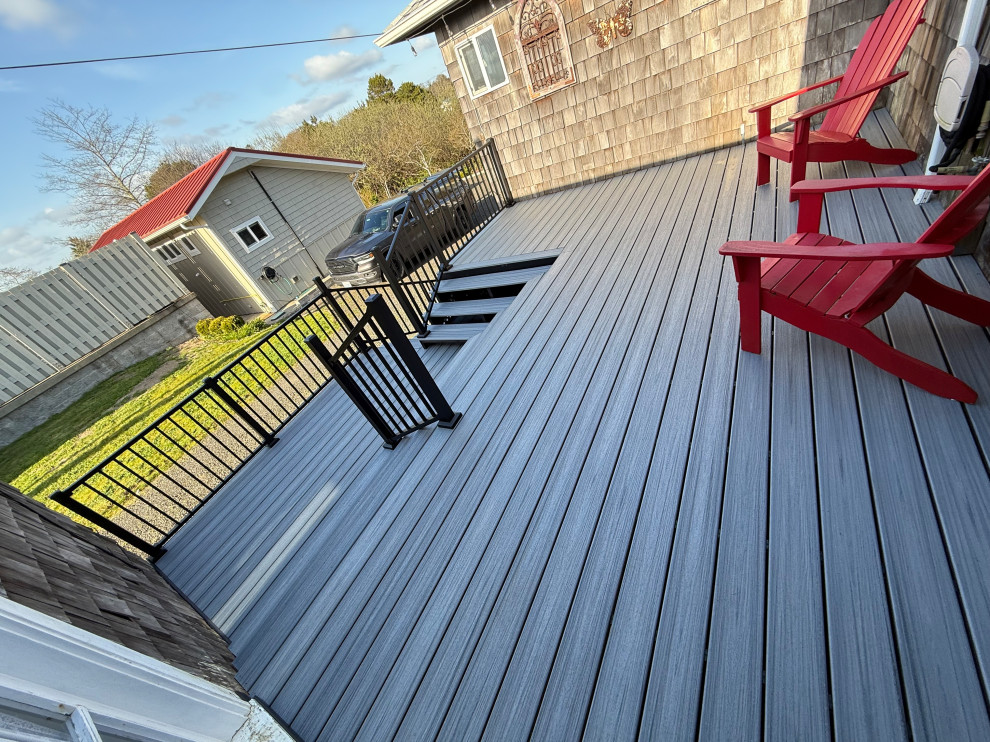Example of a beach style deck design in Seattle