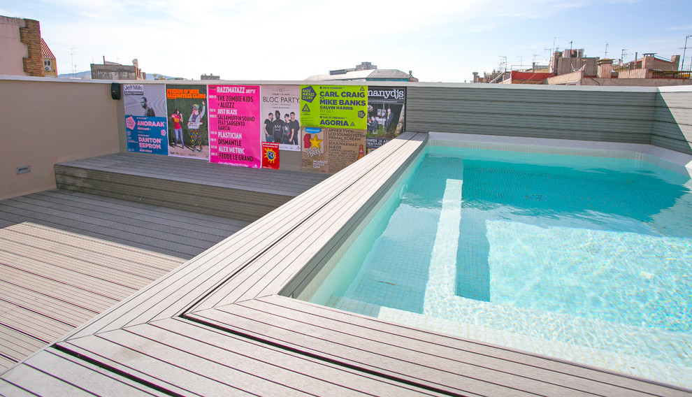 Mid-sized contemporary rooftop rectangular lap pool in Barcelona.
