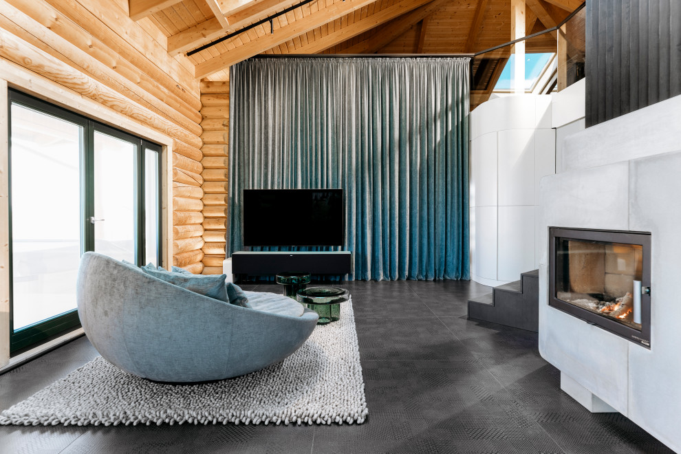 Photo of a large contemporary formal open concept living room in Frankfurt with ceramic floors, a wood stove, a concrete fireplace surround, a wall-mounted tv and black floor.